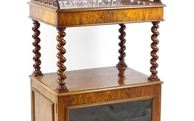 A late 19th century walnut whatnot / side cabinet surmounted by a pierced floral decorated upstand