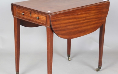 A late George III mahogany Pembroke table, fitted with a frieze drawer, on square tapering legs and