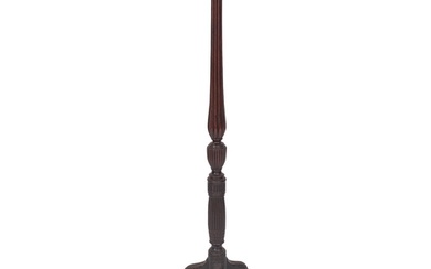 A mahogany torchere stand in George II style, 19th century; ...