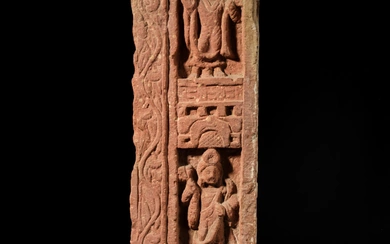 A mottled red sandstone panel of Buddha and bodhisattvas, Central India, Mathura, 2nd century