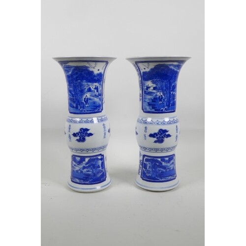 A pair of Chinese blue and white porcelain Gu shaped vases d...