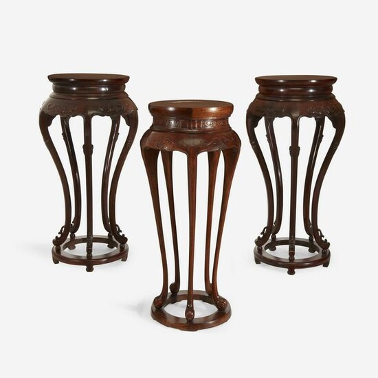 A pair of Chinese hardwood circular stands