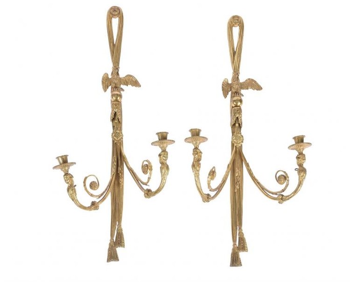A pair of French gilt bronze twin light wall appliques in Empire taste, early 20th century