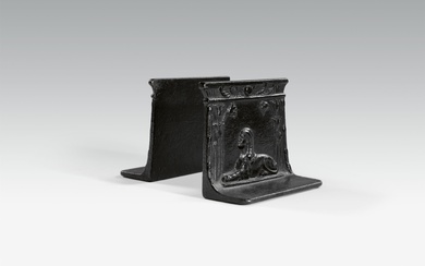 A pair of cast iron sphinx bookends