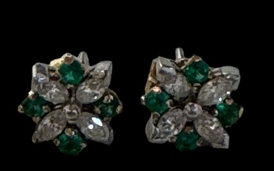 A pair of diamond and green stone cluster stud earrings Mar...