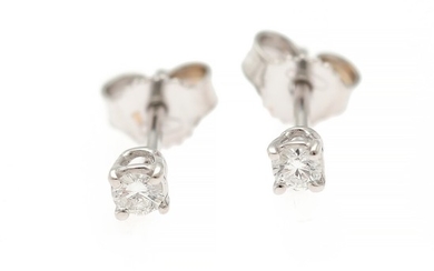 A pair of diamond solitarie ear studs each set with a brilliant-cut diamond weighing a total of app. 0.18 ct., mounted in 18k white gold. (2)