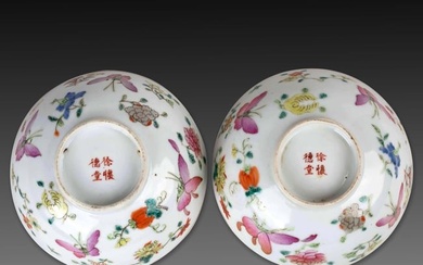 A pair of famille rose butterfly floral bowls with Xu Huaide Tang mark