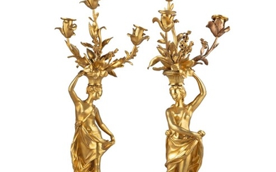 A pair of late Louis XVI gilt bronze three-light figural candelabra | Paire de candélabres à trois lumières en bronze doré de la fin de l'époque Louis XVI