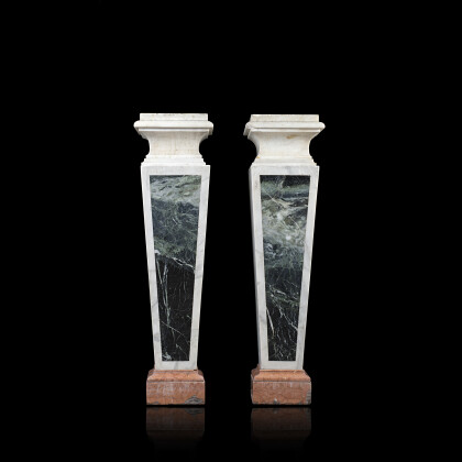 A pair of marble pedestals (h. cm 127,5) (losses)...