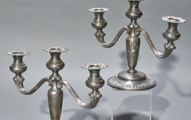 A pair sterling weighted three light candelabra