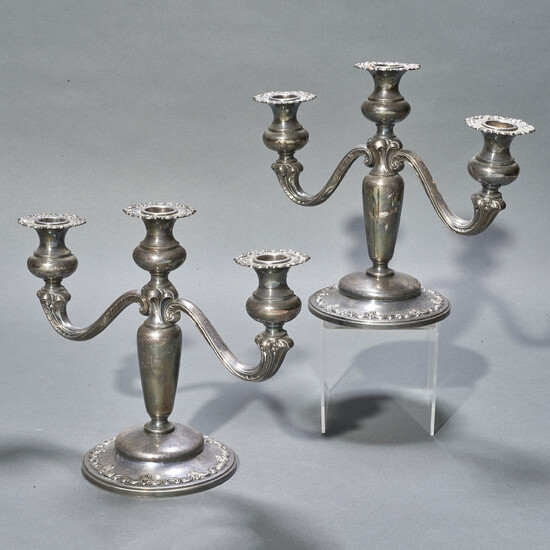 A pair sterling weighted three light candelabra