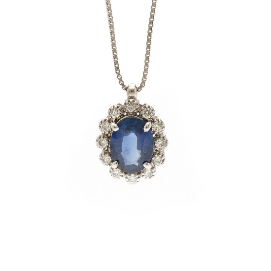 A sapphire and diamond pendant set with a sapphire encircled by numerous diamonds, mounted in 18k white gold, on an 18k white gold necklace. (2)