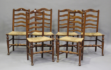 A set of six early 19th century provincial fruitwood ladder back kitchen chairs, height 95cm, width