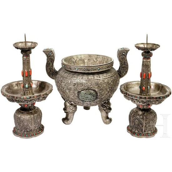A three-part Sino-Mongolian silver altar set, adorned