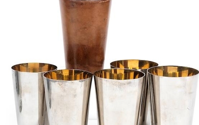 A vintage leather-cased set of five graduated beakers