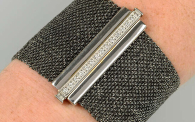 A woven bracelet, with pavé-set diamond clasp, by Carolina Bucci.