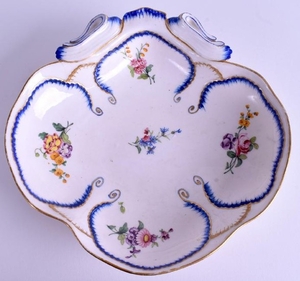 AN 18TH CENTURY SEVRES PORCELAIN SCALLOPED DISH painted