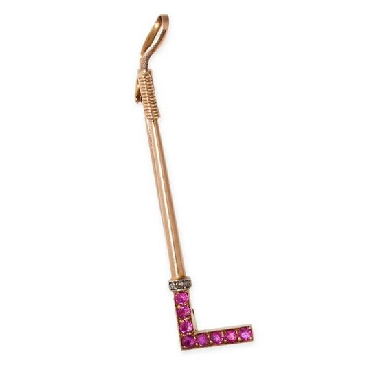 AN ANTIQUE RUBY AND DIAMOND RIDING CROP BROOCH in