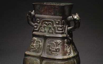 AN IMPORTANT AND RARE MONUMENTAL ARCHAISTIC BRONZE RITUAL WINE VESSEL,...