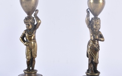 AN UNUSUAL PAIR OF MID 19TH CENTURY BRONZE ETHNOGRAPHICAL CA...