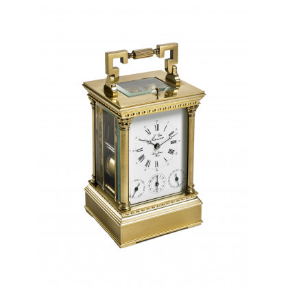 ANONYMOUS, Francia Brass and glass travel clock Late XIX/early XX century Weekly wind movement White dial with Roman numerals, with…Read more