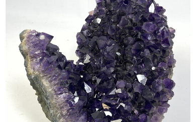 Amethyst Brazilian Geode. Natural Mineral Specimen. Rich purple color
