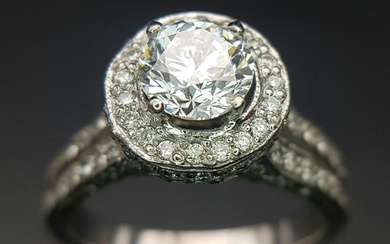 An 18 K white gold ring with a brilliant cut diamond (1.01 c...
