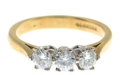 An 18ct gold synthetic moissanite three-stone ring.