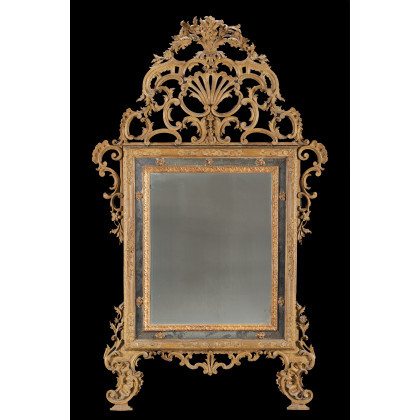 An 18th-century Piedmont carved and lacquered wood mirror decorated with floral motifs and rocaille (cm 173x90) (defects)