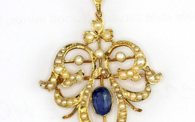 An Edwardian 9ct yellow gold brooch/pendant set with an oval cut sapphire and seed pearls, L.4.5cm. (One pearl missing).