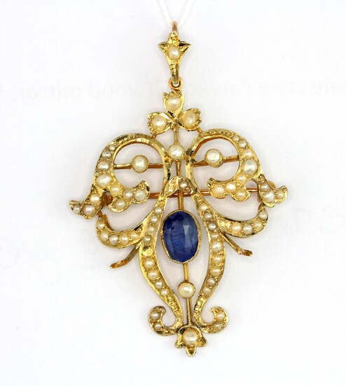 An Edwardian 9ct yellow gold brooch/pendant set with an oval cut sapphire and seed pearls, L.4.5cm. (One pearl missing).