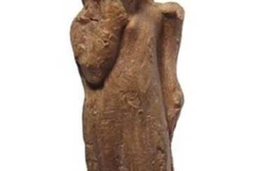 An Egyptian terracotta figure of Harpokrates
