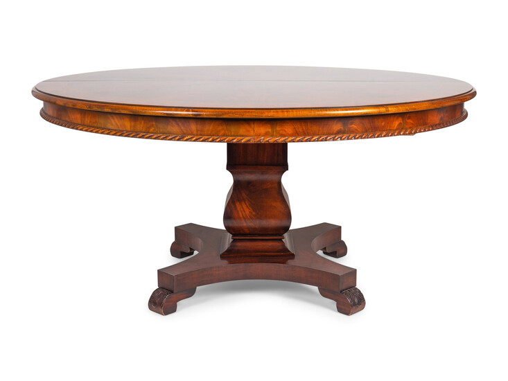 An Empire Style Figured Mahogany Pedestal Dining Table