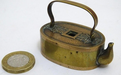 An Oriental miniature teapot / kettle with a swing
