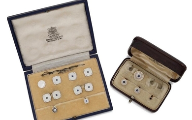 An incomplete set of mother of pearl and sapphire dress studs and cufflinks, case signed Carrington & Co., the part-set comprising: a pair of cufflinks, the square panels with canted corners to single link connections, stamped 9ct, three matching...