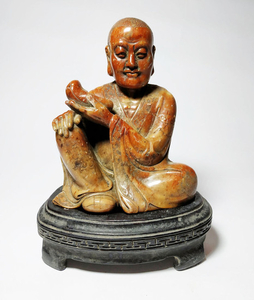 An old stone Chinese figure