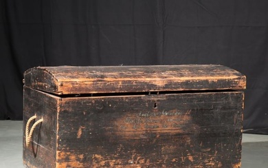 Antique 19th Century wooden dome top steamer trunk chest with metal staves, rope handles, and black