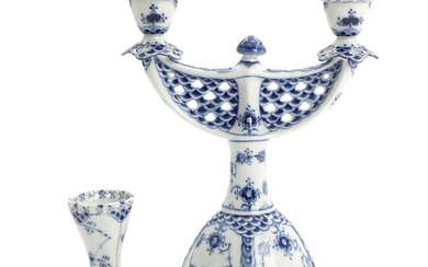 SOLD. "Blue Fluted Full Lace". Royal Copenhagen porcelain two-armed candlestick and vase. H. 25 and 10 cm. (2) – Bruun Rasmussen Auctioneers of Fine Art