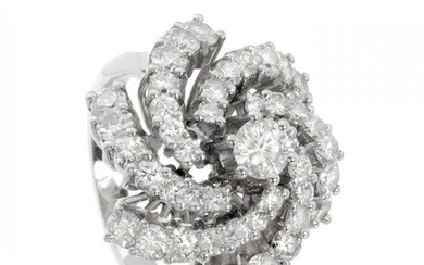 BombÃ© ring, 1950s. In 18 kt white gold. Frontispiece with a spiral rosette with a central brilliant