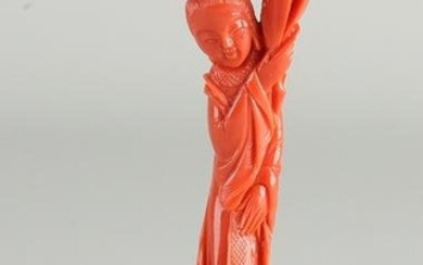 Carved Quan Yin of red coral, H 11 cm.