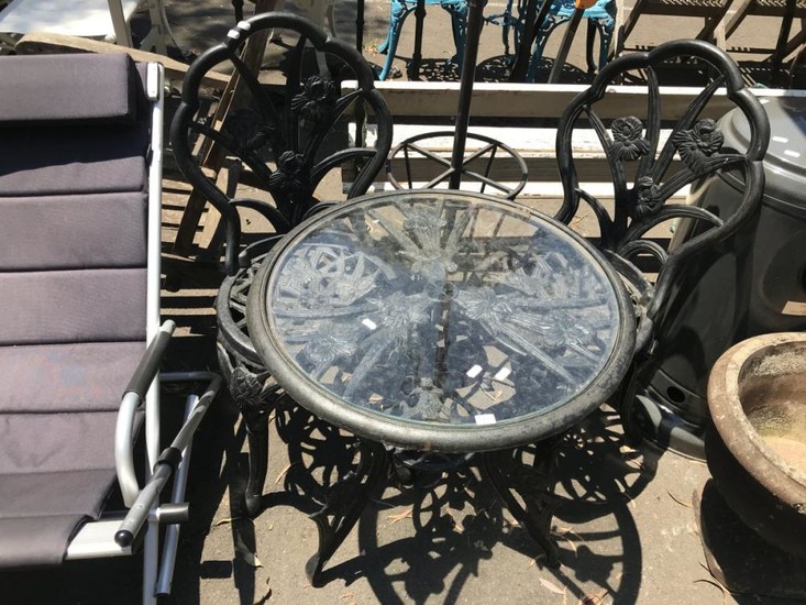 Cast Iron Three Piece Outdoor Suite incl. Round Glass Insert Table & Pair of Chairs