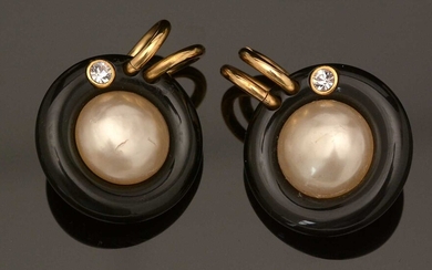 Chanel: a pair of faux mabe-pearl, black plastic and gilt metal earrings
