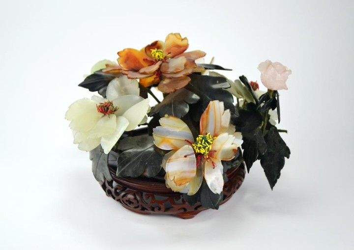 Chinese centerpiece in jade, coral and hard stone.