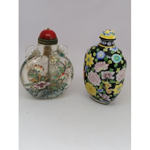 Chinese glass and enamel snuff bottle containing snuff T/W a...