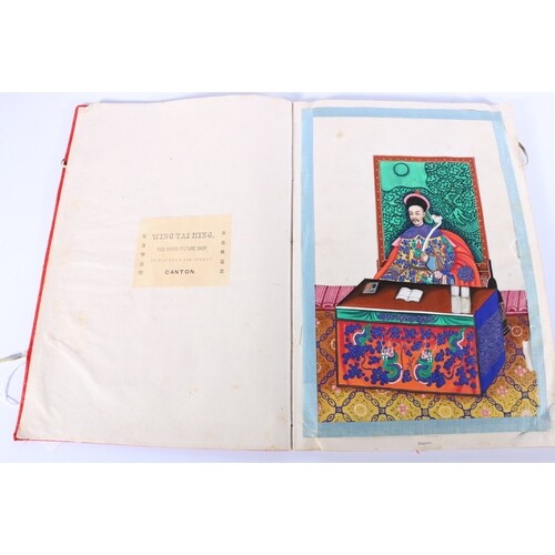 Chinese silk covered book containing twelve rice paper paint...