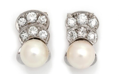 SOLD. Christian Schmidt Rasmussen: A pair of pearl and diamond ear clips each set with six brilliant-cut diamonds and a cultured pearl, mounted in 14k white gold. (2) – Bruun Rasmussen Auctioneers of Fine Art