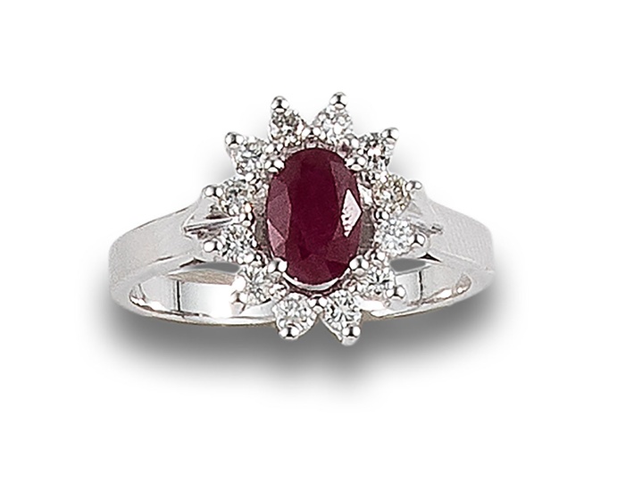 DIAMOND AND RUBY ROSETTE RING, IN WHITE GOLD