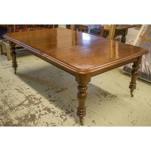 DINING TABLE, Victorian mahogany with extra leaf, brass cast...