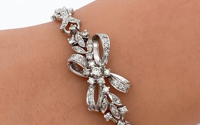 Diamond And 14k White Gold Bow Bracelet