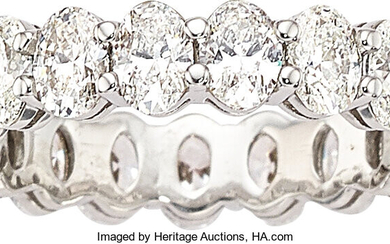 Diamond, Platinum Eternity Band Stones: Oval-shaped diamonds weighing a...
